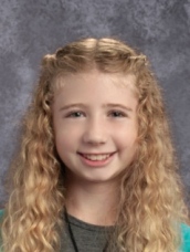 photo of a young girl with curly hair